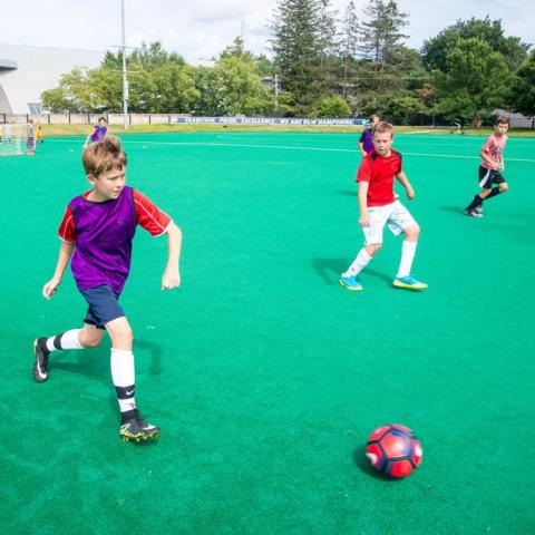 Children playing soccer