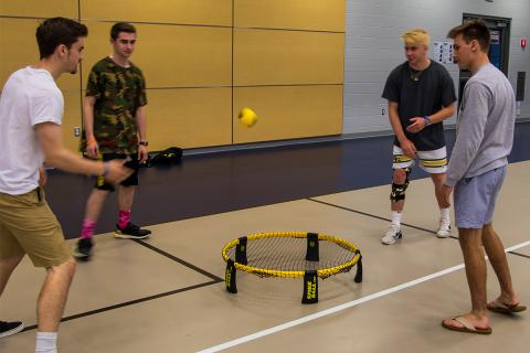 Students playing spikeball